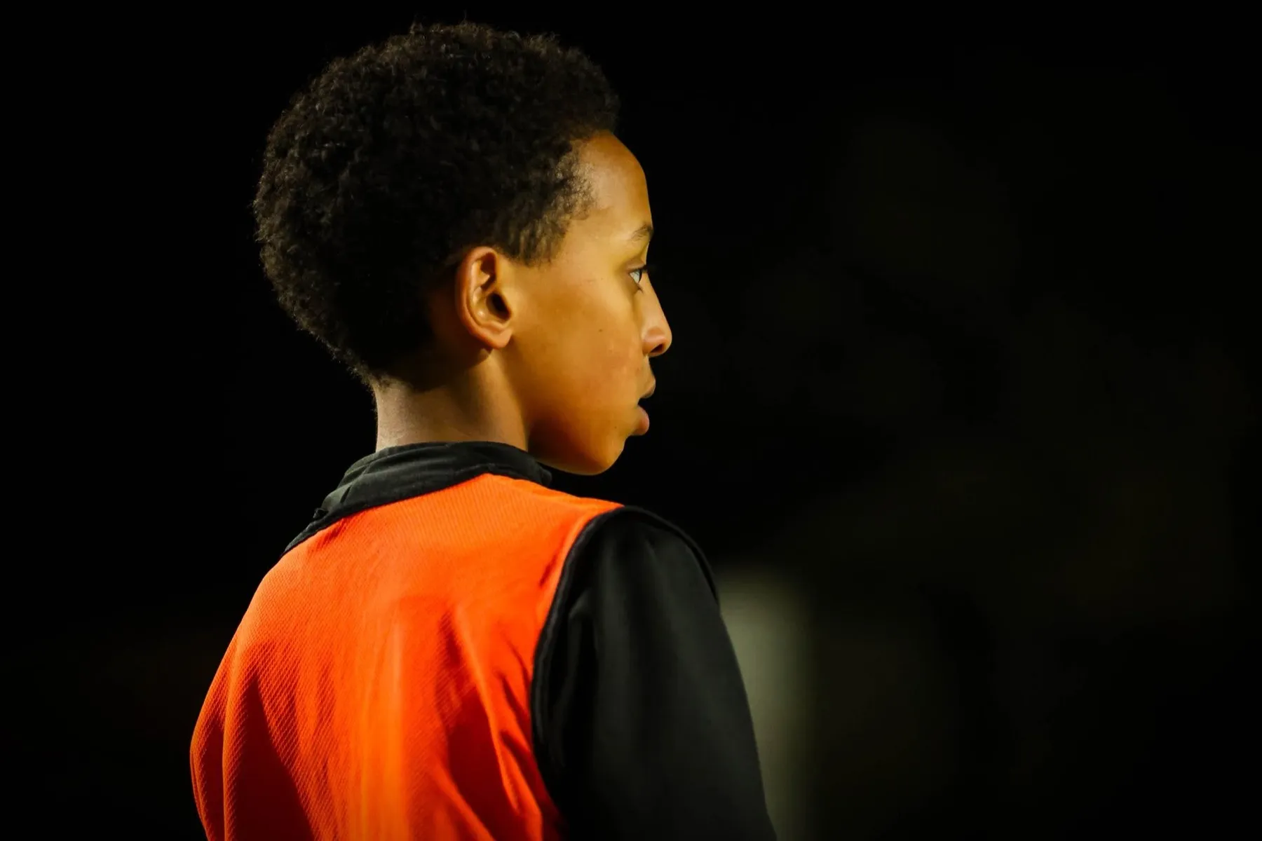 Close-up of a young DNA Academy player focused during training