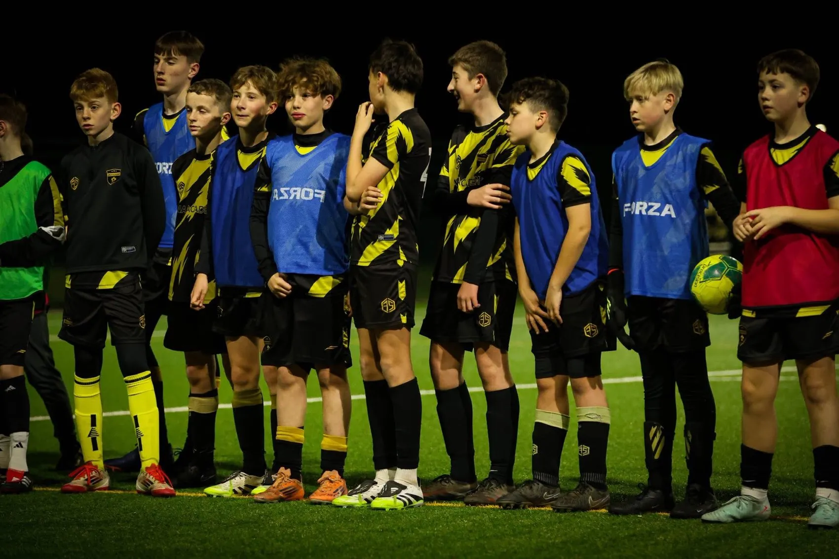 A DNA Academy grassroots squad together at training