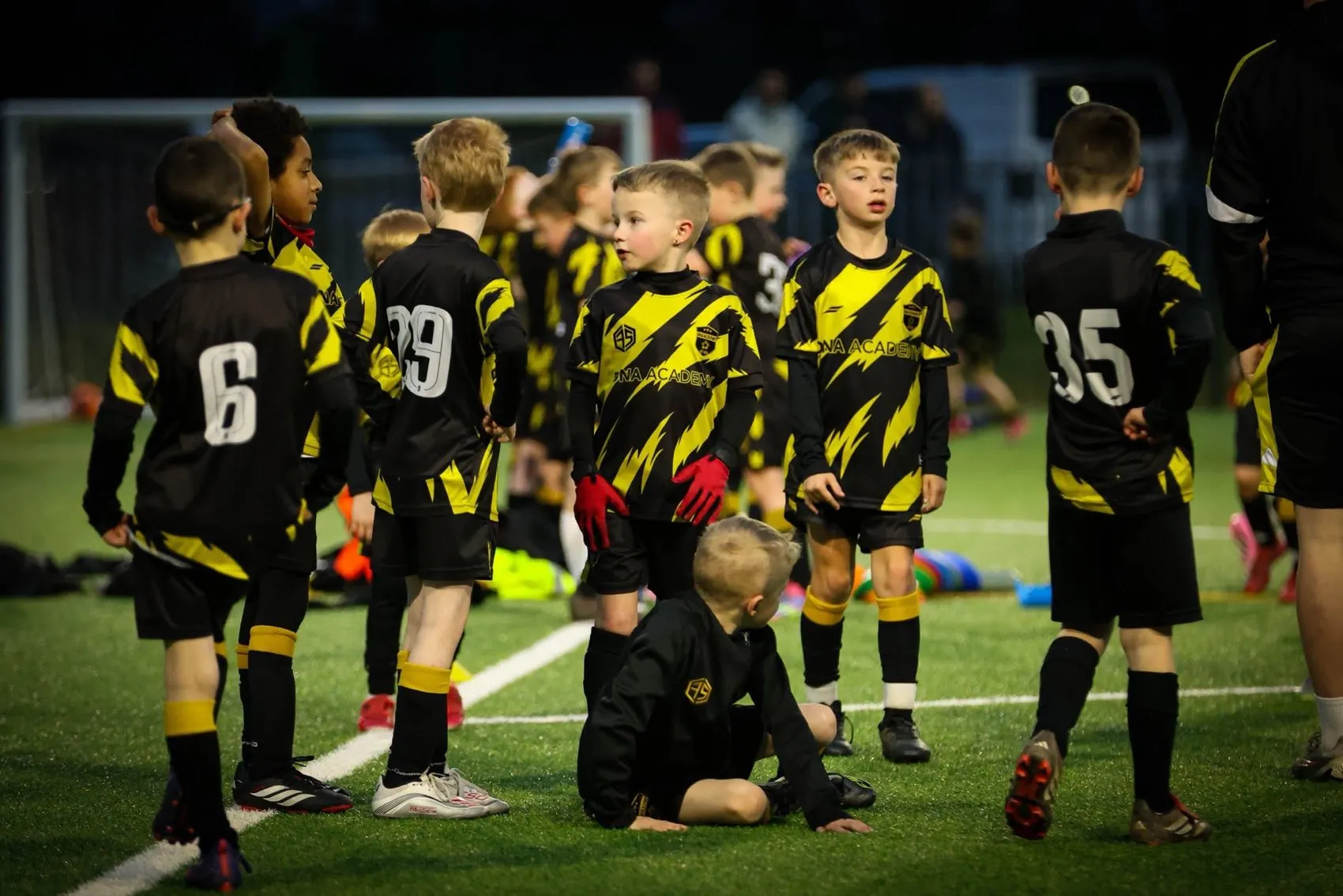 DNA Academy grassroots squad lined up in kit before a match