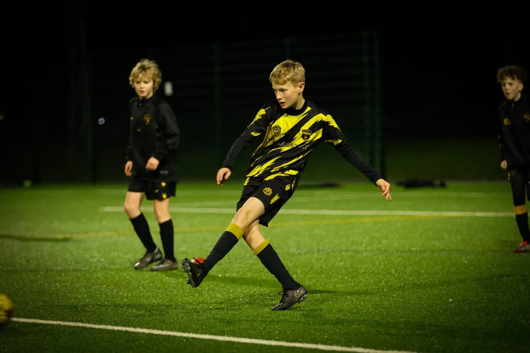 A DNA Academy player striking the ball during a 1-to-1 session