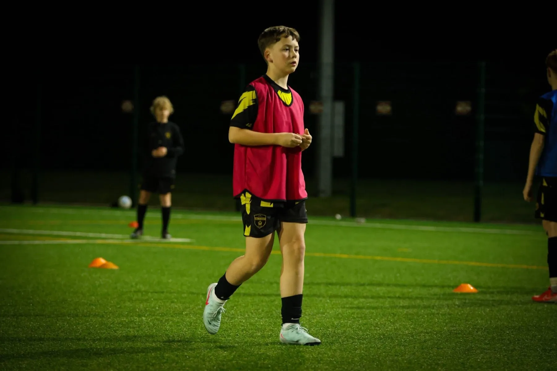 A young player working through an individual drill